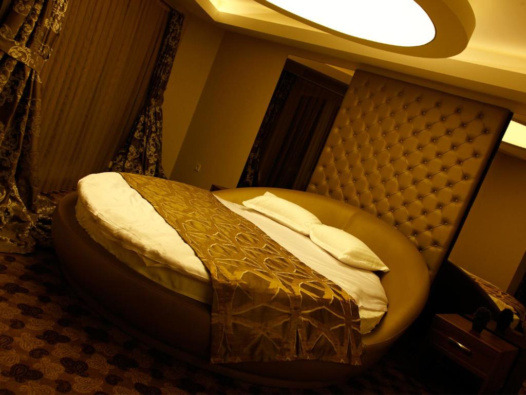Postel nebo postele na pokoji v ubytování Feyzan Hotel