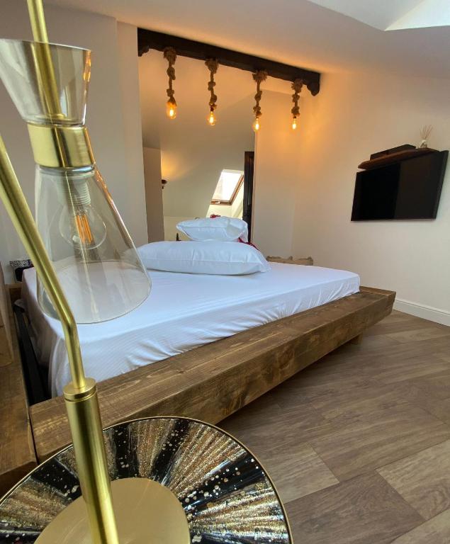 Postel nebo postele na pokoji v ubytování Domino Hotel