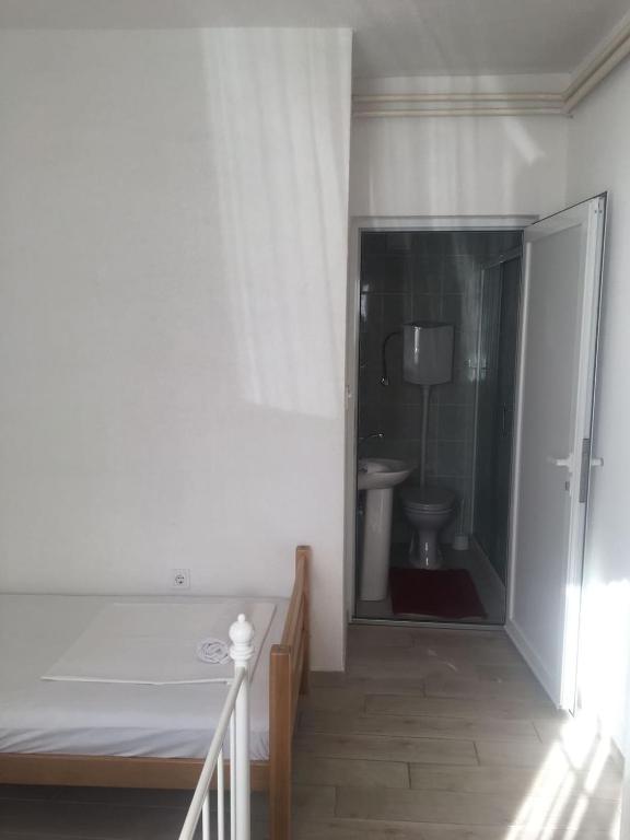 Postel nebo postele na pokoji v ubytování Apartments Niković