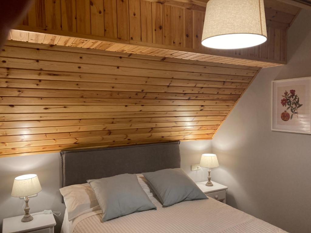 Postel nebo postele na pokoji v ubytování Eth Céu de Salardú