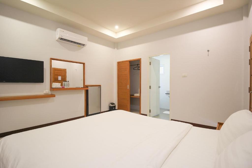 Postel nebo postele na pokoji v ubytování AKARD Private Villas Sattahip