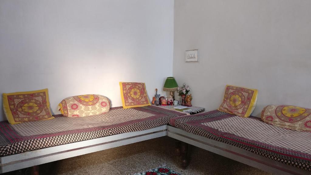 Ένα ή περισσότερα κρεβάτια σε δωμάτιο στο Perfect Home by mQube