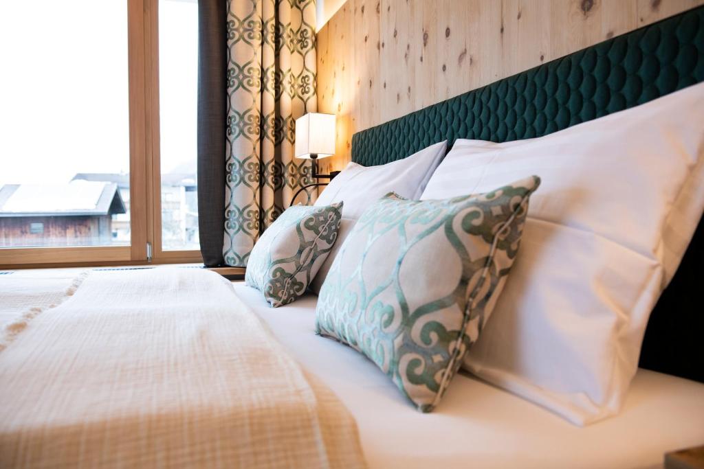 Ein Bett oder Betten in einem Zimmer der Unterkunft Natur Resort RISSBACHER