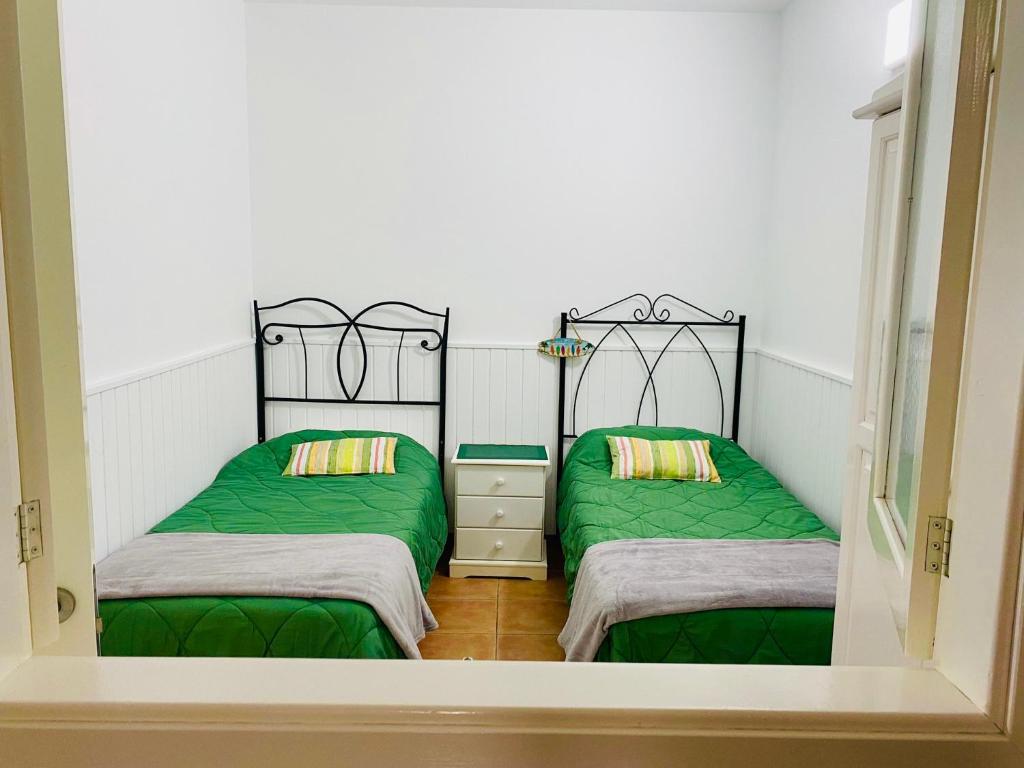 Postel nebo postele na pokoji v ubytování SaVoa 247