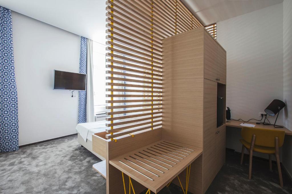 TV a/nebo společenská místnost v ubytování Bed & Atmosphere Rooms