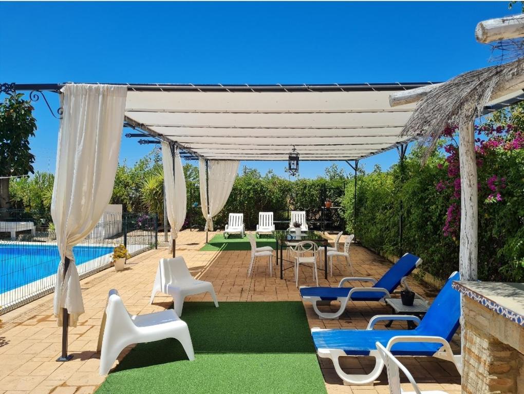 The swimming pool at or close to Villa Mirador del Sol, 45min playas de Doñana, 35min de Sevilla
