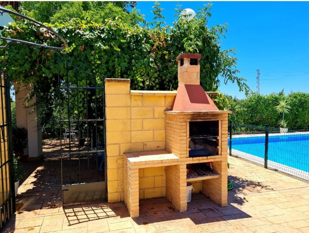The swimming pool at or close to Villa Mirador del Sol, 45min playas de Doñana, 35min de Sevilla