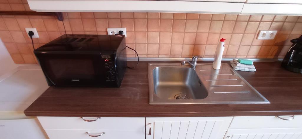 Kuchyňa alebo kuchynka v ubytovaní Bp SOHO GRAND Apartment