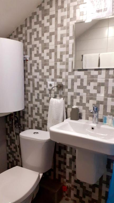 Koupelna v ubytování Hotel Lile
