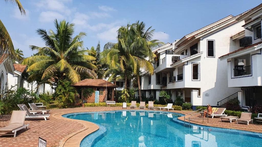 Bazén v ubytování Casa Legend Villa & Apartments Arpora - Baga - Goa nebo v jeho okolí