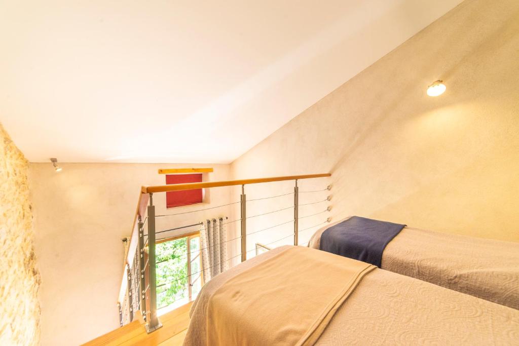 Postel nebo postele na pokoji v ubytování Maison d'Hôtes Mas de la Chadenede