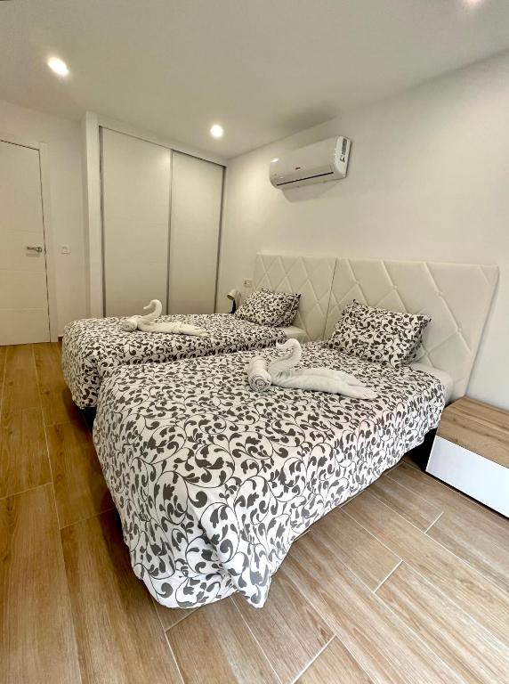 Postel nebo postele na pokoji v ubytování Apartamento Sunrise Chapaprieta