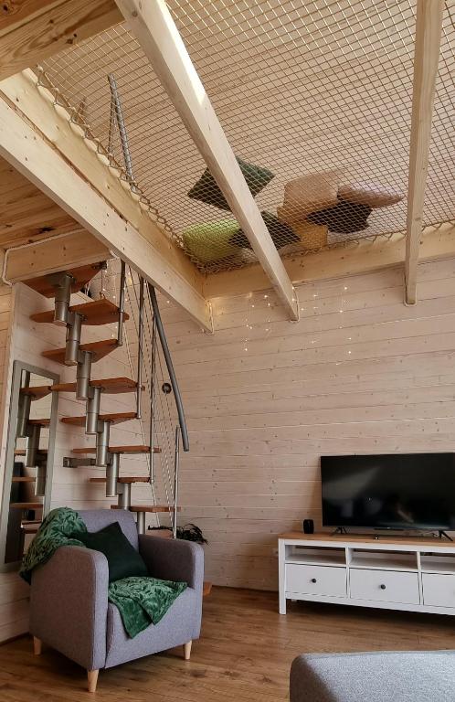 TV a/nebo společenská místnost v ubytování Browarówka