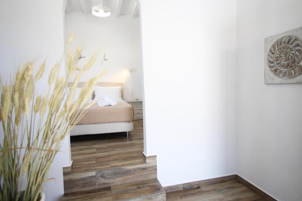 Postel nebo postele na pokoji v ubytování Crystal View Mykonos