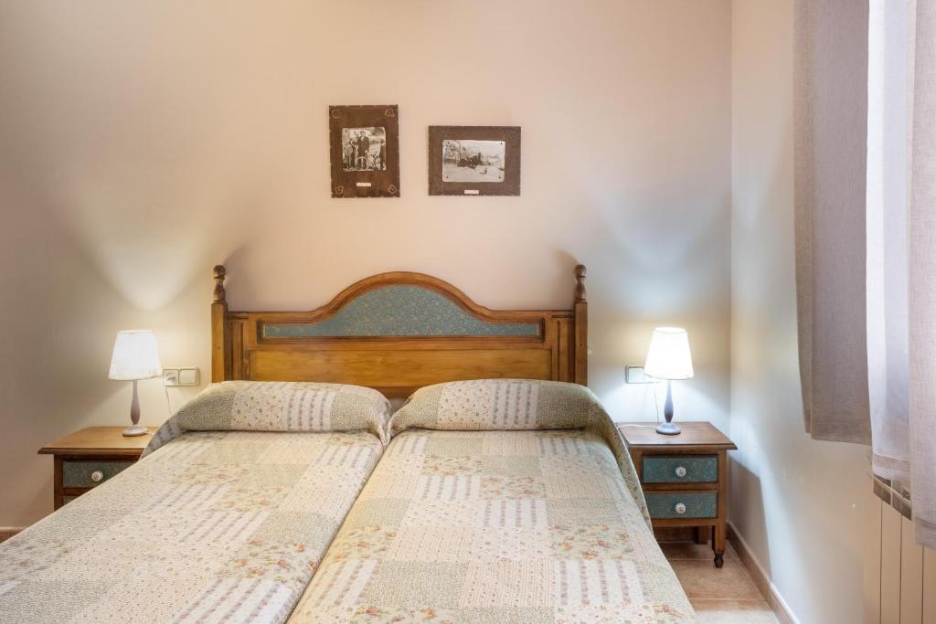 Postel nebo postele na pokoji v ubytování El Rincón de Andrea Apartamentos