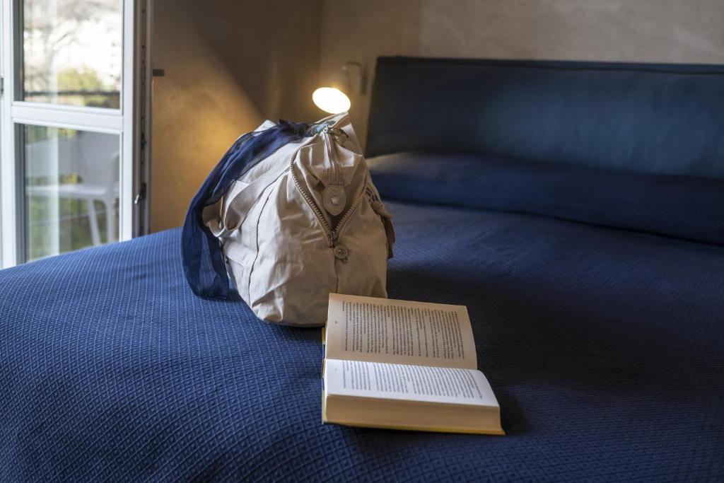 Postel nebo postele na pokoji v ubytování Il Roseto