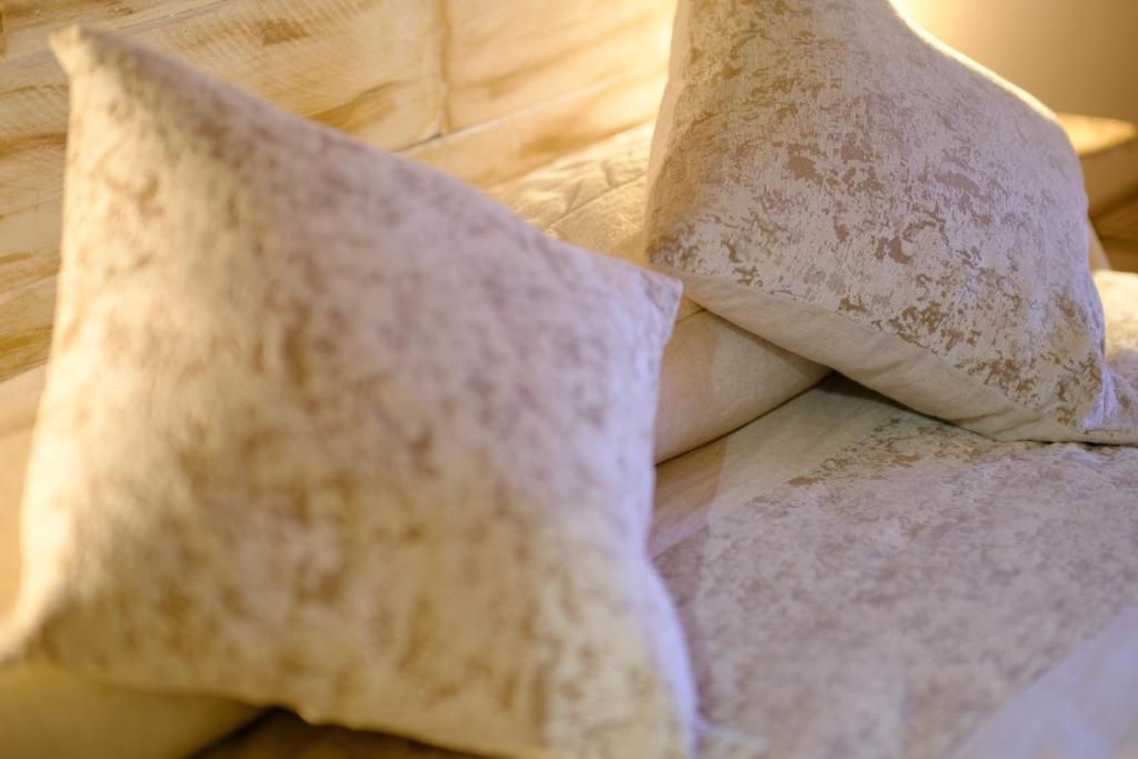 Postel nebo postele na pokoji v ubytování El Rincón de Andrea Apartamentos