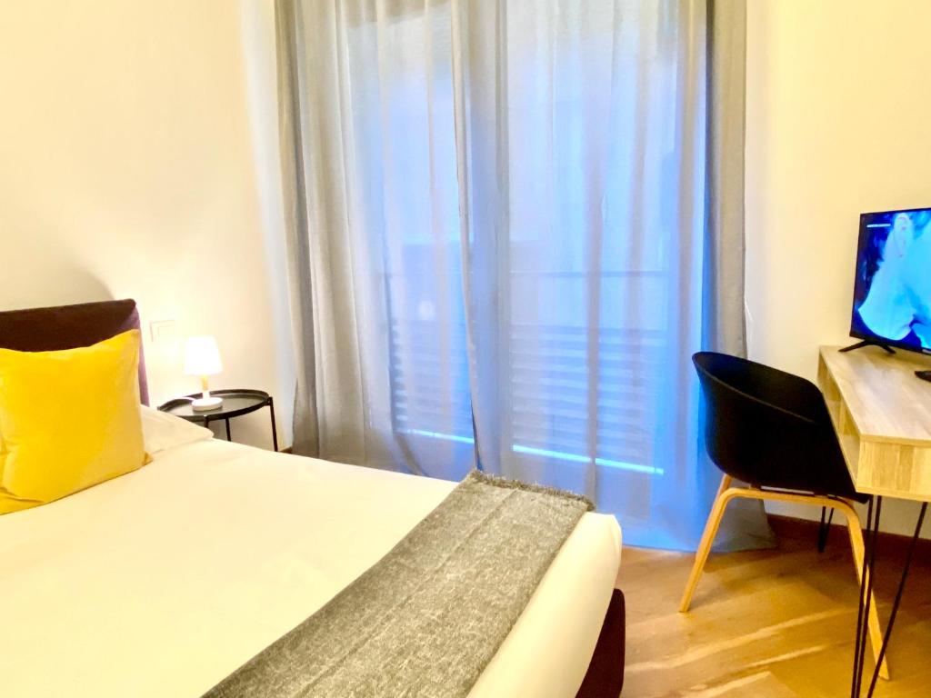 TV a/nebo společenská místnost v ubytování Palazzina B - Smart Rooms