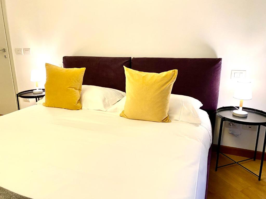 Postel nebo postele na pokoji v ubytování Palazzina B - Smart Rooms