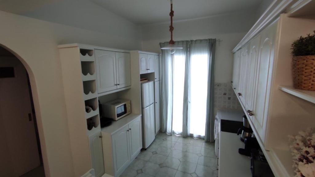 Kuchyňa alebo kuchynka v ubytovaní Camara House, Antiparos