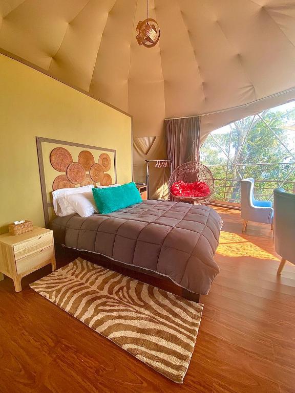 Postel nebo postele na pokoji v ubytování Kintiri Glamping
