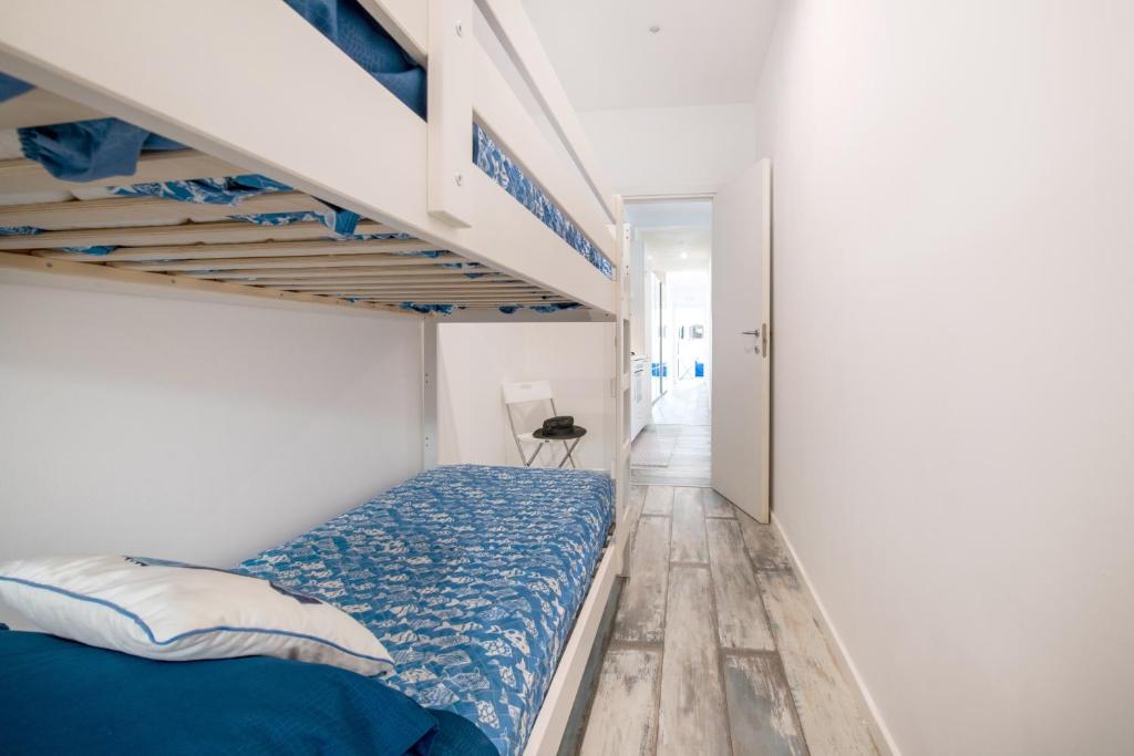 Postel nebo postele na pokoji v ubytování Il Ciottolo Sorrento