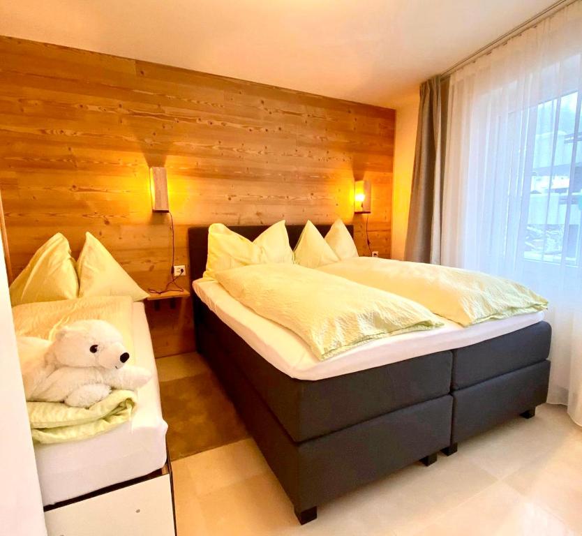 Postel nebo postele na pokoji v ubytování Apartments Steinbock
