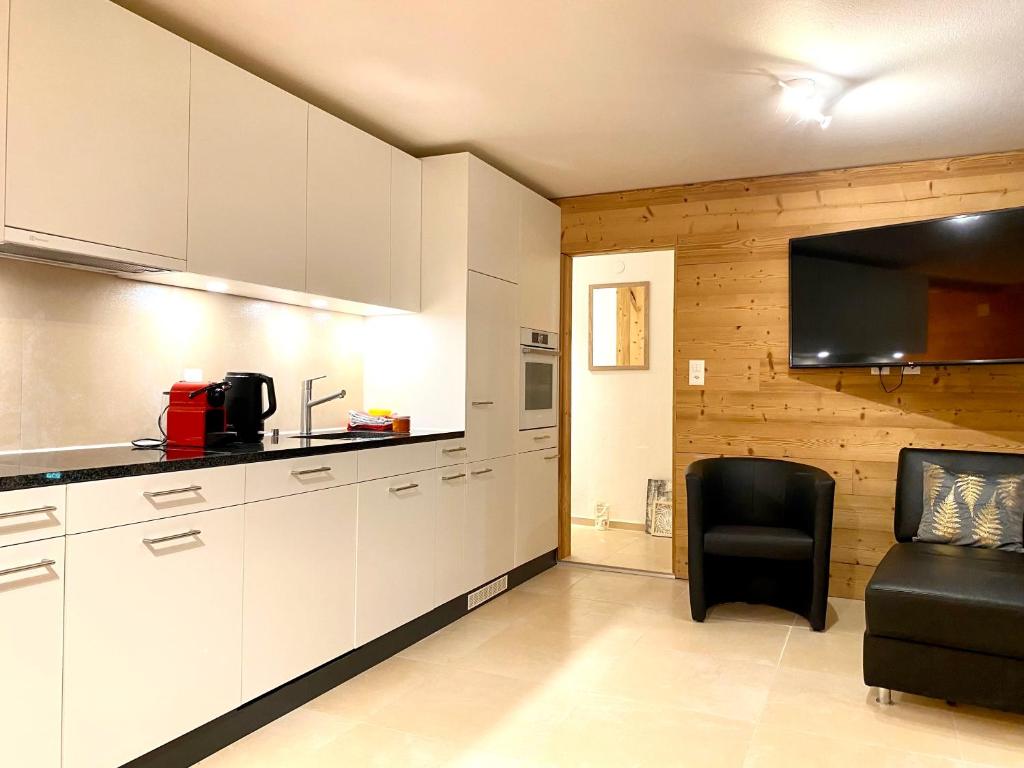 Kuchyň nebo kuchyňský kout v ubytování Apartments Steinbock