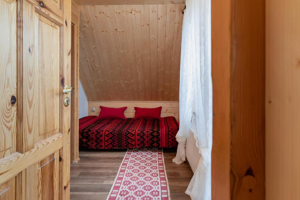 Postel nebo postele na pokoji v ubytování PUSTELNIA WODZA
