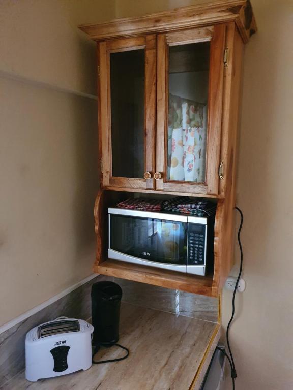 Kuchyň nebo kuchyňský kout v ubytování Mesmerize Guest House