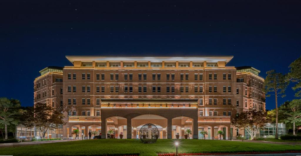 a large building with an arch in front of it at Mayfield Hotel Seoul in Seoul