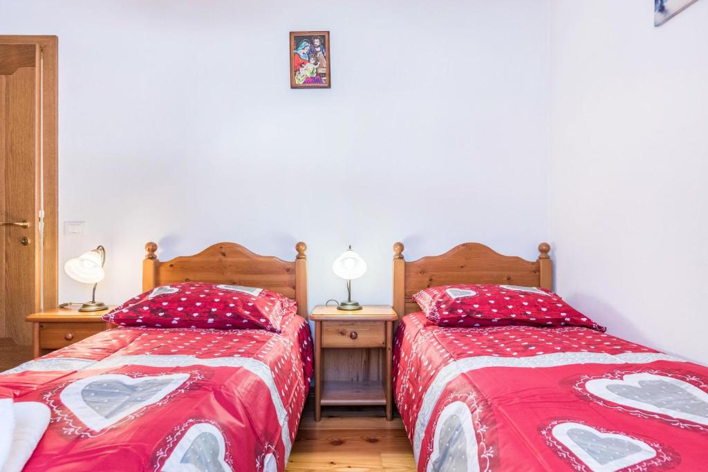 Łóżko lub łóżka w pokoju w obiekcie Agritur Alle Quattro Stagioni