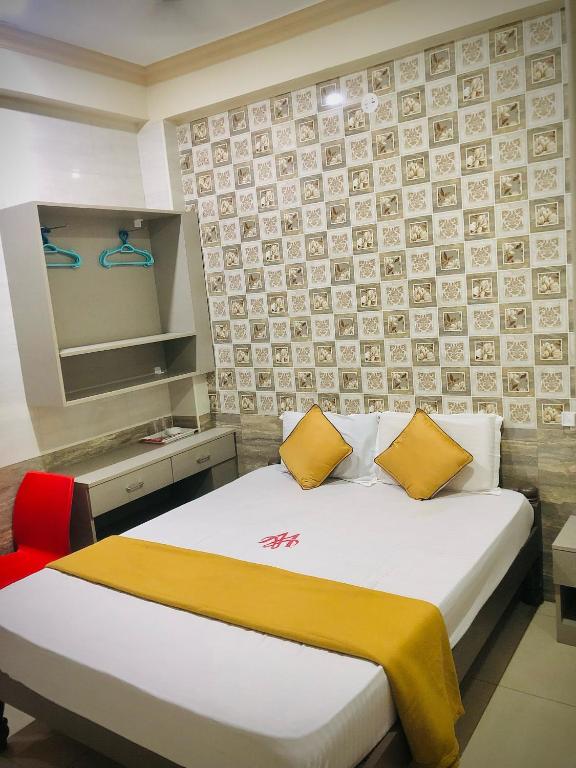 Postel nebo postele na pokoji v ubytování MARINA PALACE