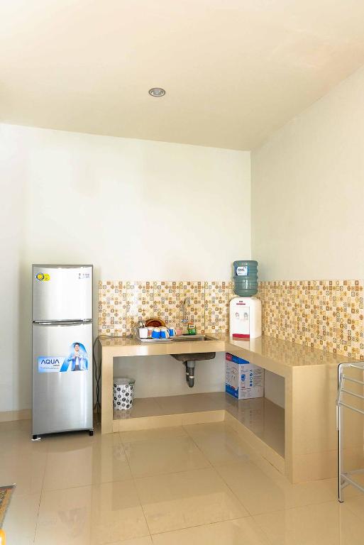 Kuchyň nebo kuchyňský kout v ubytování Rosetta Homestay