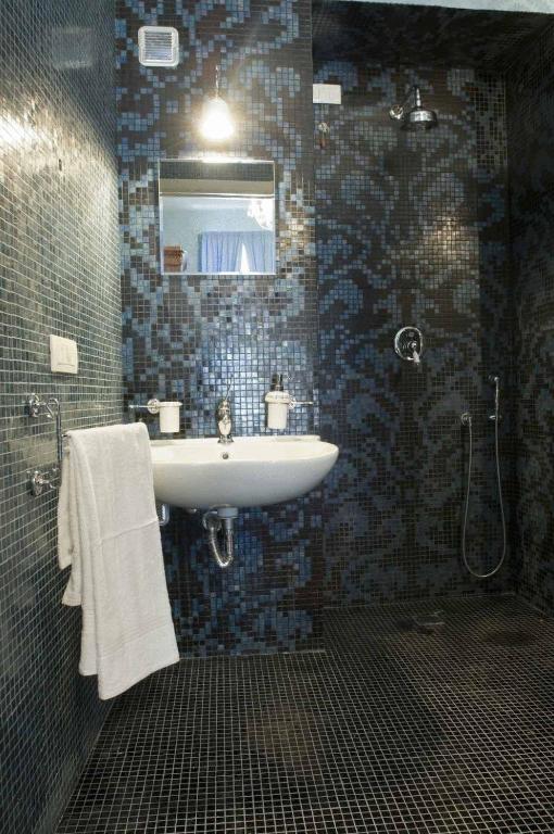 Koupelna v ubytování Grana Barocco Art Hotel