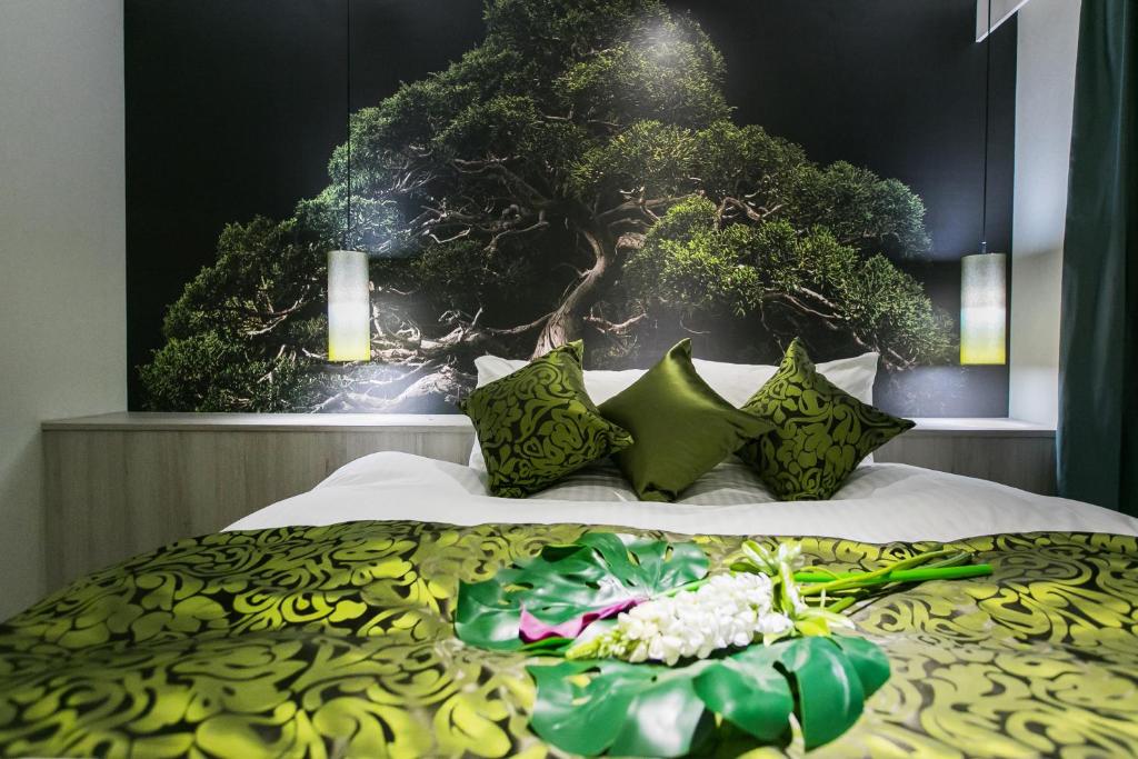 Postel nebo postele na pokoji v ubytování HOTEL 粋