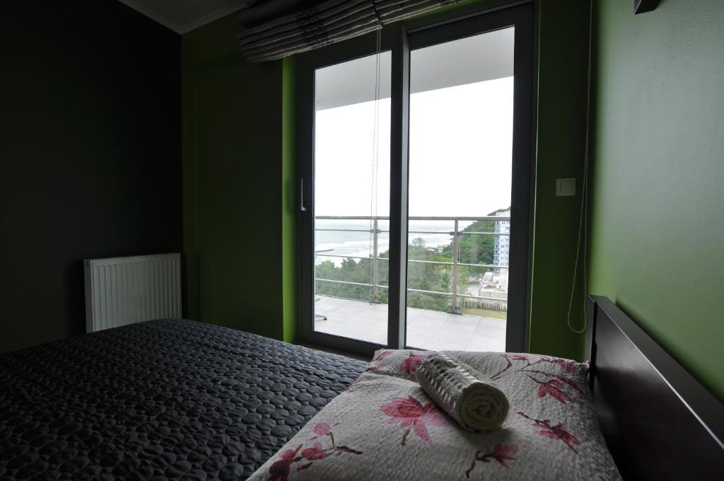 Postel nebo postele na pokoji v ubytování Promenada28pl - Apartamenty z widokiem na morze