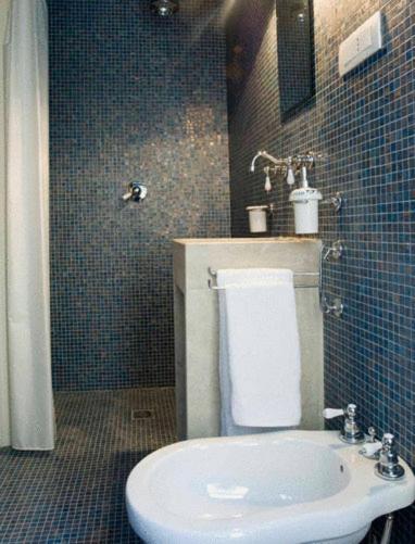 Koupelna v ubytování Grana Barocco Art Hotel