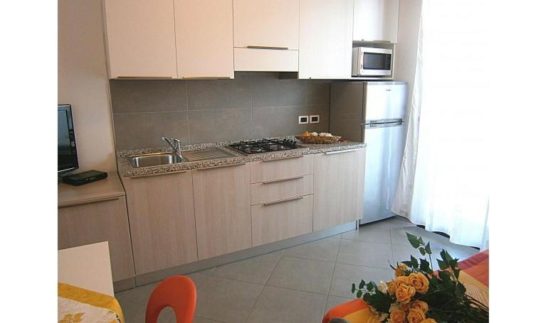 A kitchen or kitchenette at Condominio Quadrangolo-Gemini