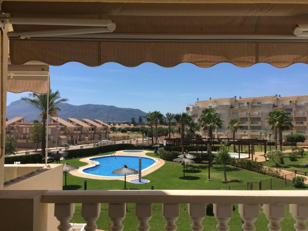 a view of the pool from the balcony of a resort at Playa Sol Denia Mediterranea-Serviden in Denia