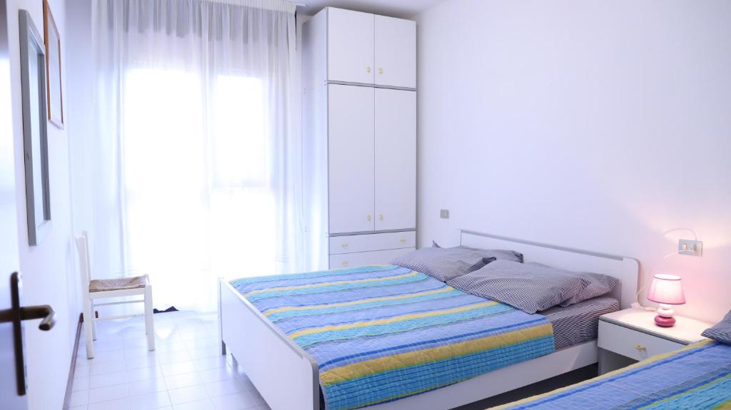 Posteľ alebo postele v izbe v ubytovaní Residence Gemini - Gemini