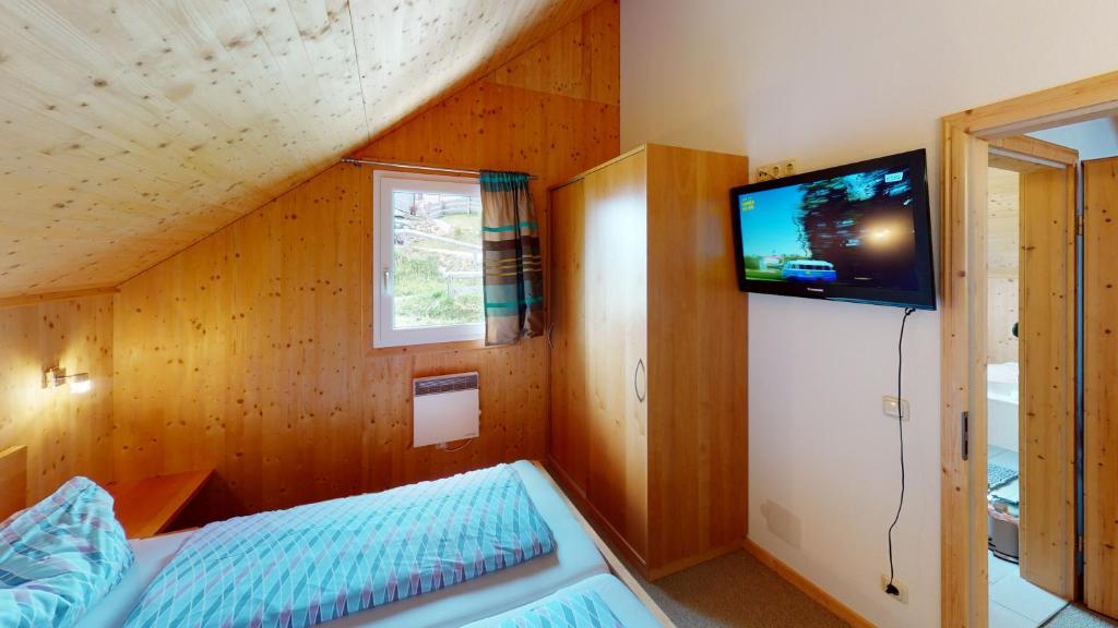 Postel nebo postele na pokoji v ubytování Klippitzhimmel