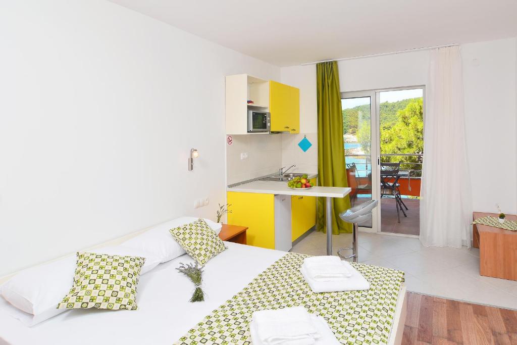 Kuchyňa alebo kuchynka v ubytovaní Apartments Juka
