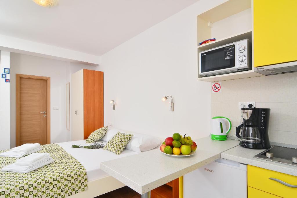 Kuchyňa alebo kuchynka v ubytovaní Apartments Juka