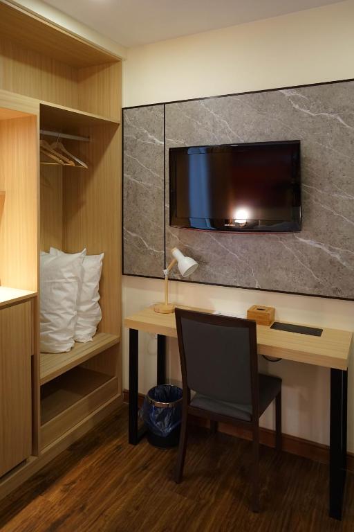 TV a/nebo společenská místnost v ubytování Hotel 17