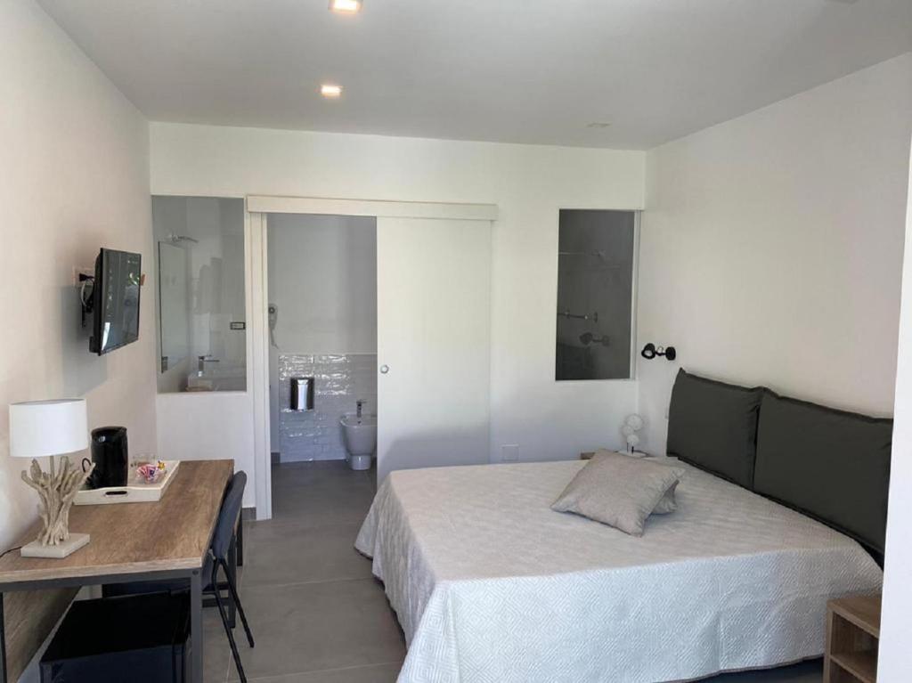 Postel nebo postele na pokoji v ubytování B&B direttamente sul mare da Antonino