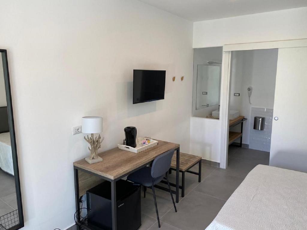 TV a/nebo společenská místnost v ubytování B&B direttamente sul mare da Antonino