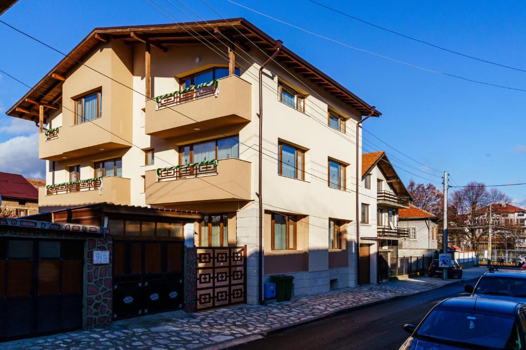 a building on the side of a street at Свети Никола in Razlog