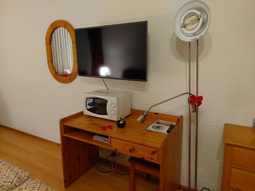 TV a/nebo společenská místnost v ubytování Résidence Panorama A201