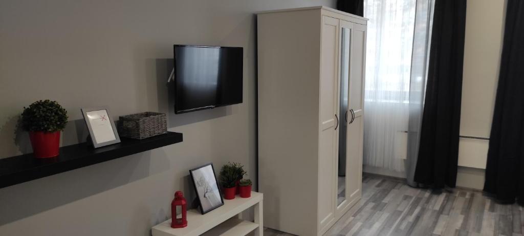 TV a/nebo společenská místnost v ubytování 7 days Apartment